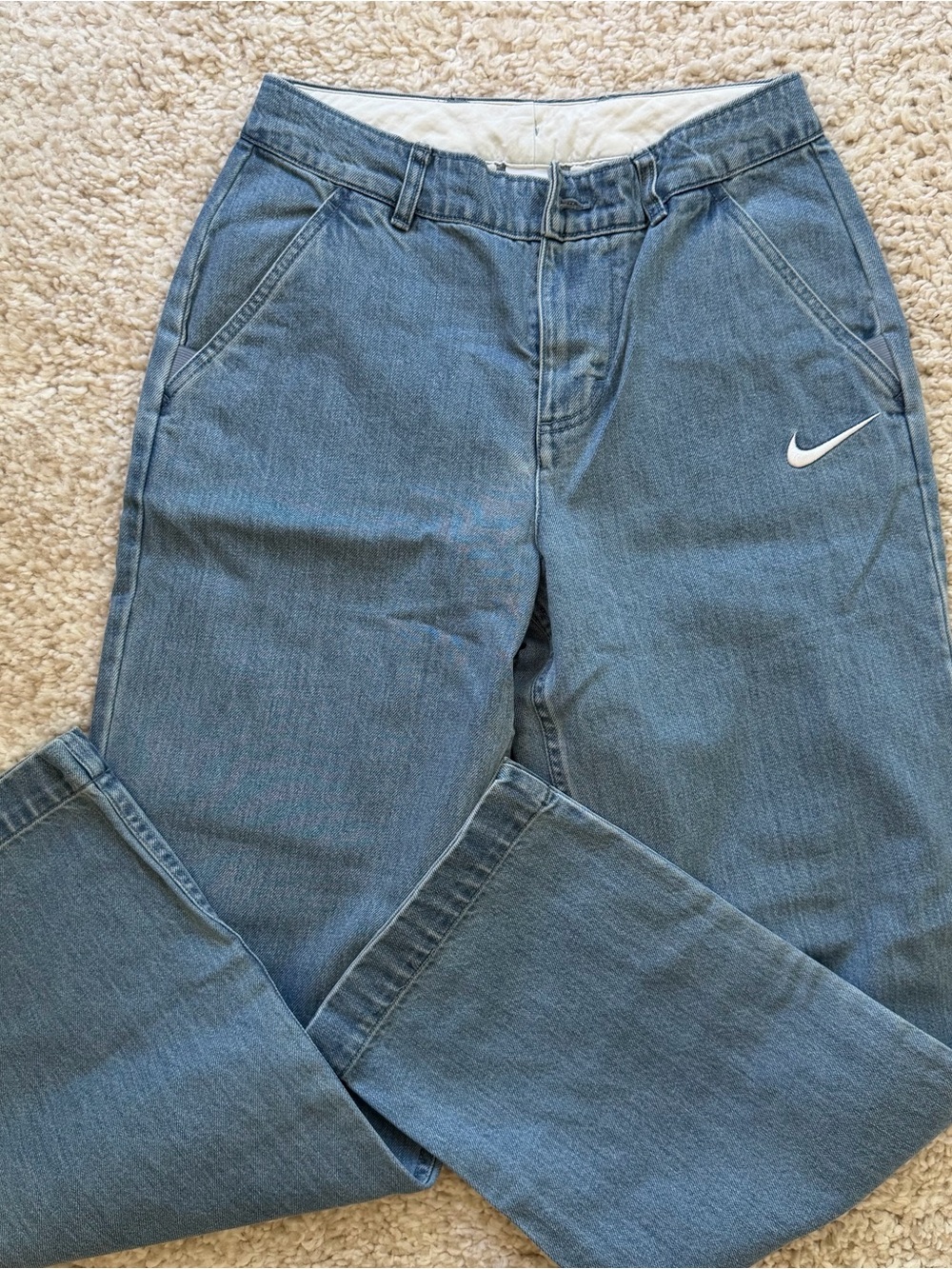 Nike Women's Straight-Leg Denim-Style Jeans in Blue with White Swoosh